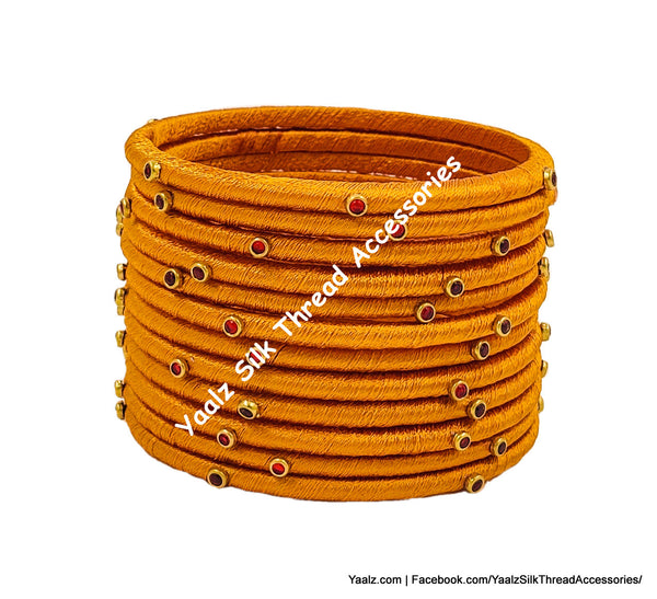Yaalz Silk Thread Weightless Thin Dozen Bangles With Kundan Stones In Assorted Colors - Set 1